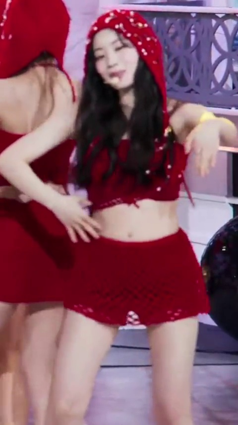 Dahyun's figure stands out in a mesh outfit.